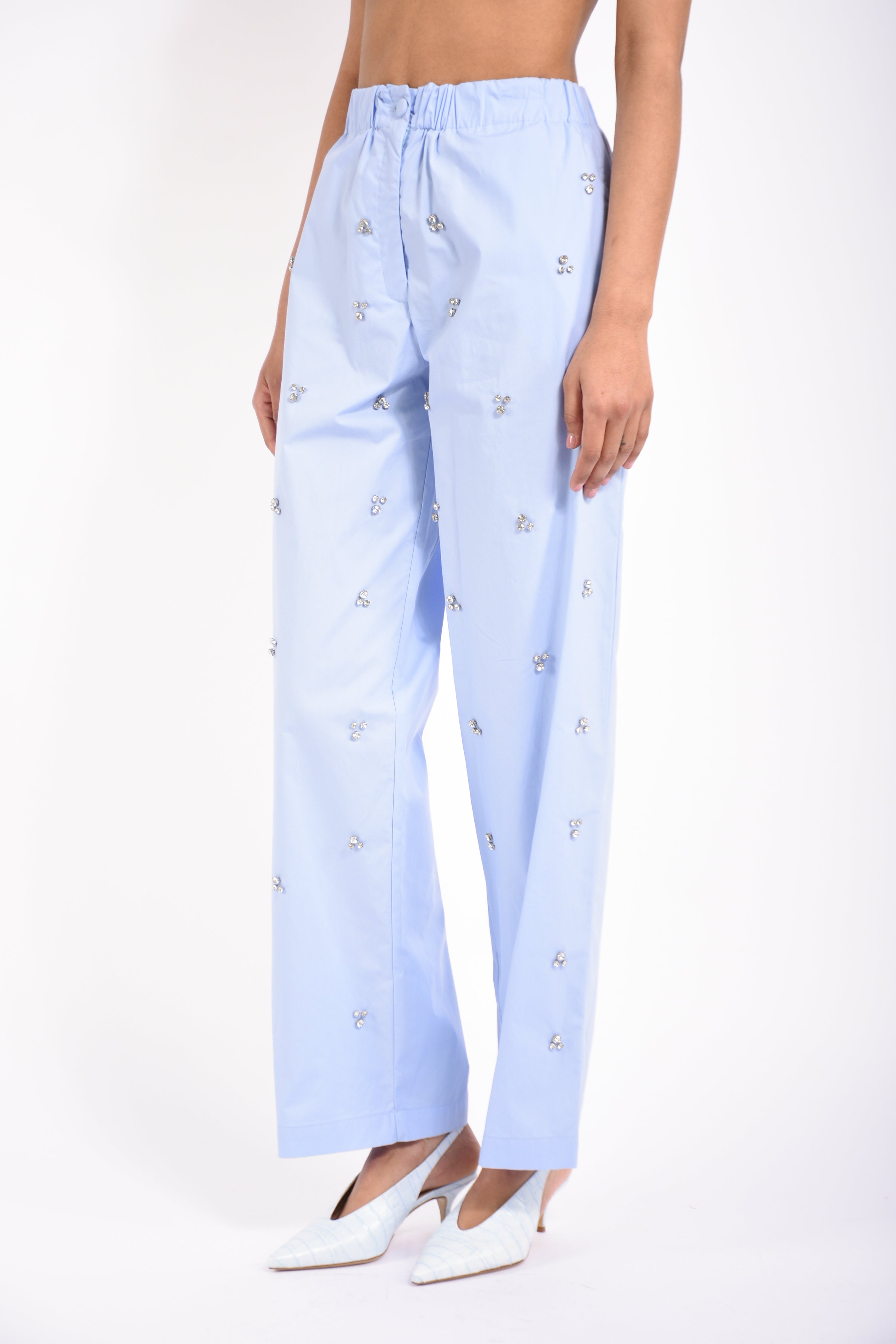 pantaloni in cotone con applicazioni