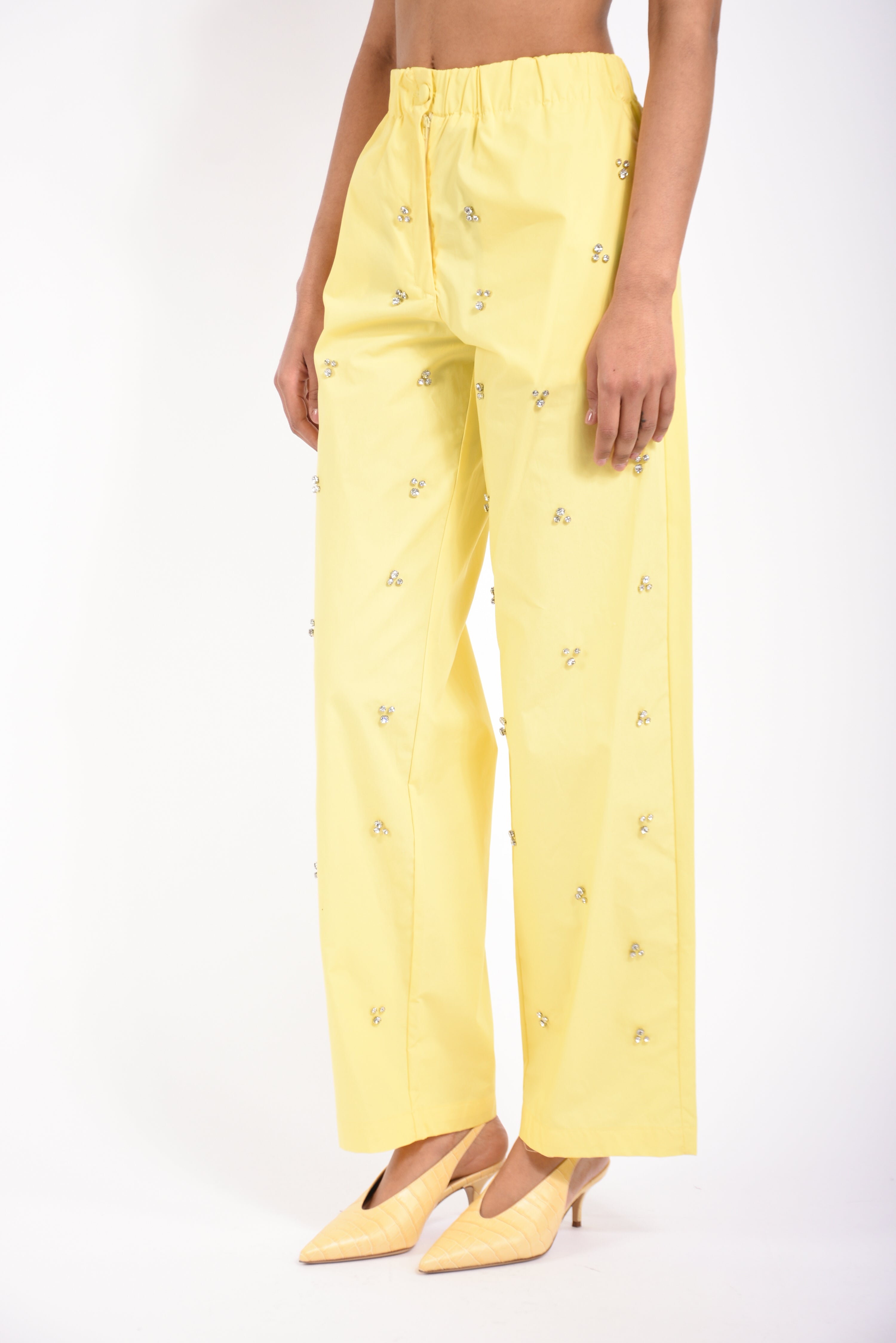 pantaloni in cotone con applicazioni