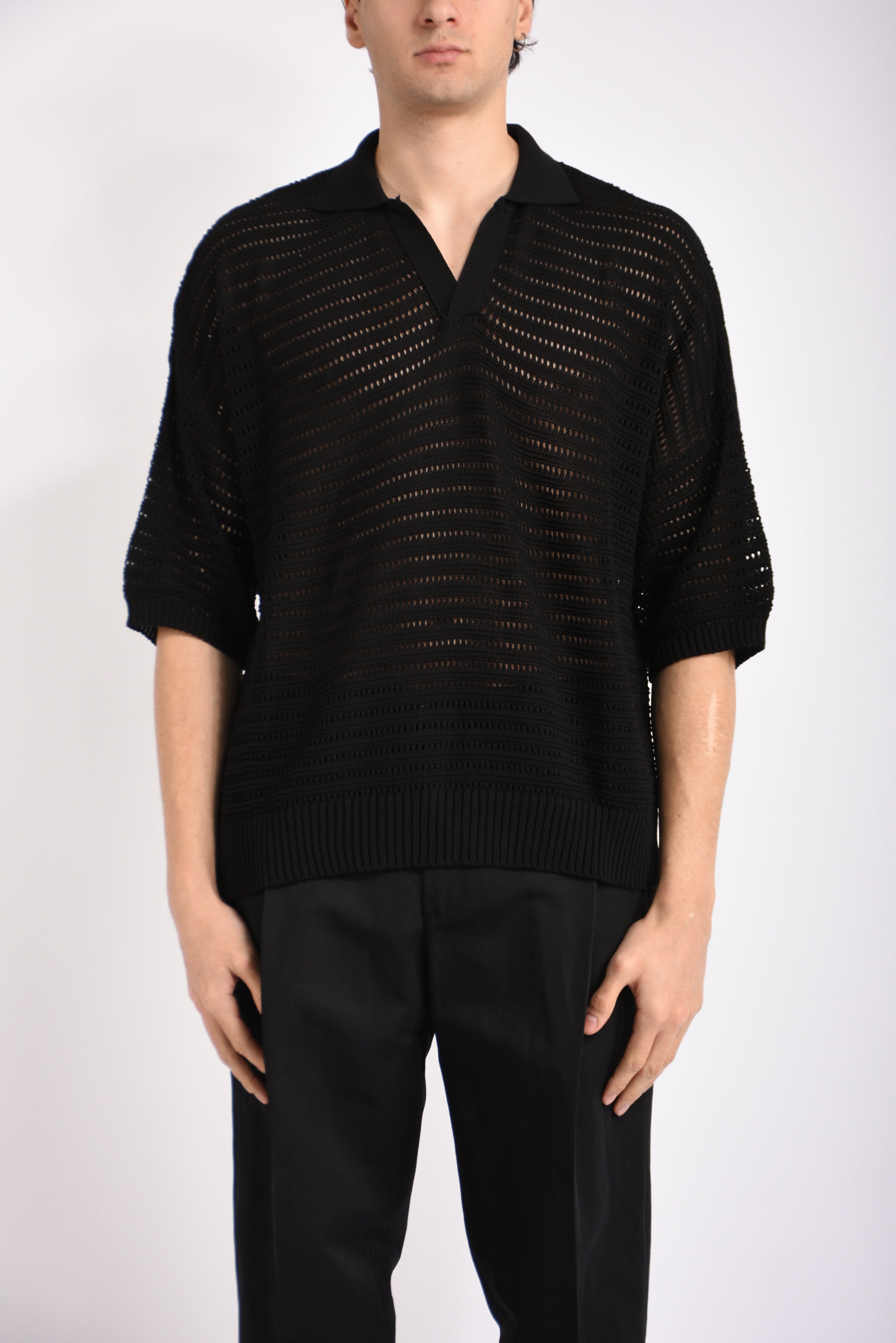 Polo traforata in cotone