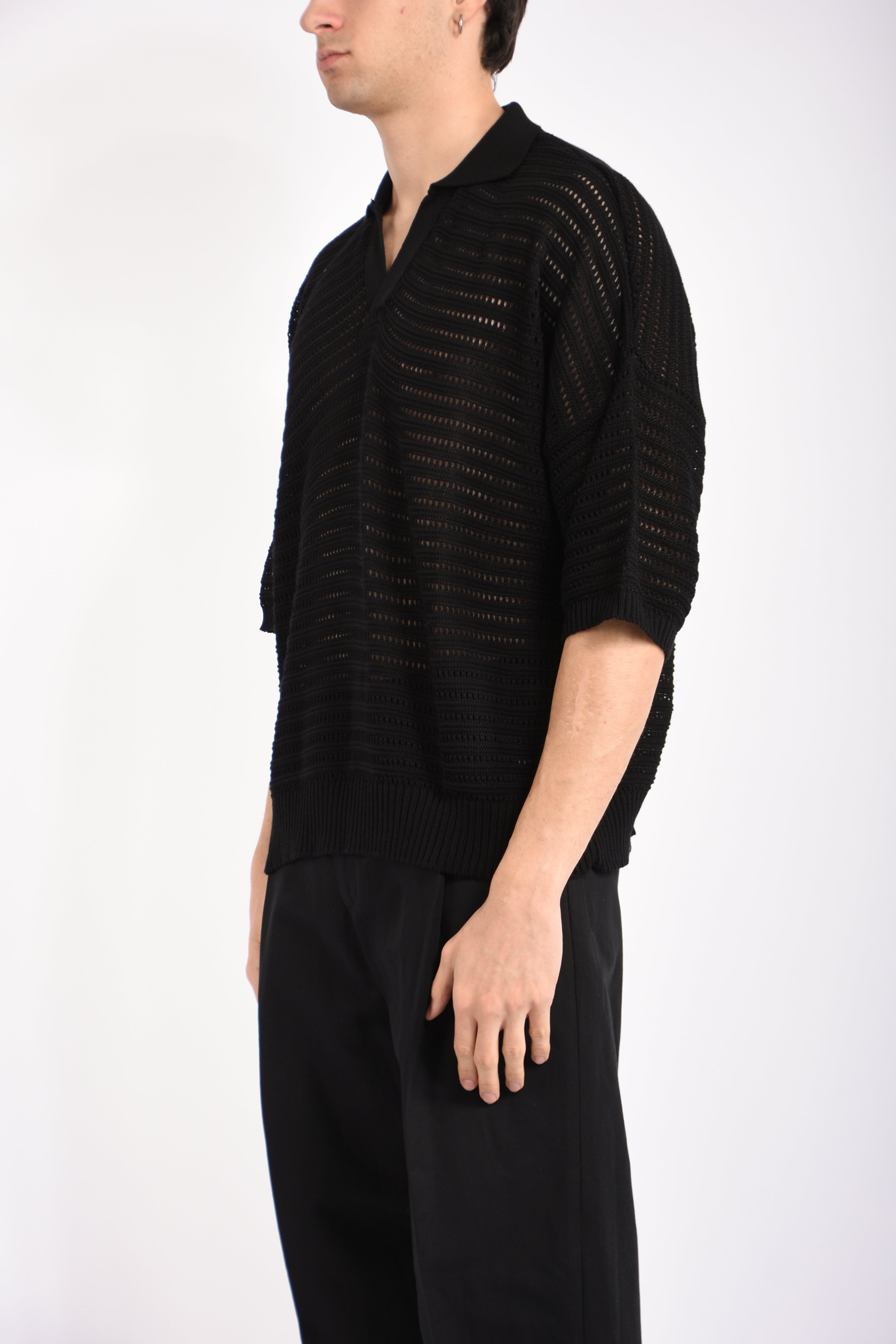 Polo traforata in cotone