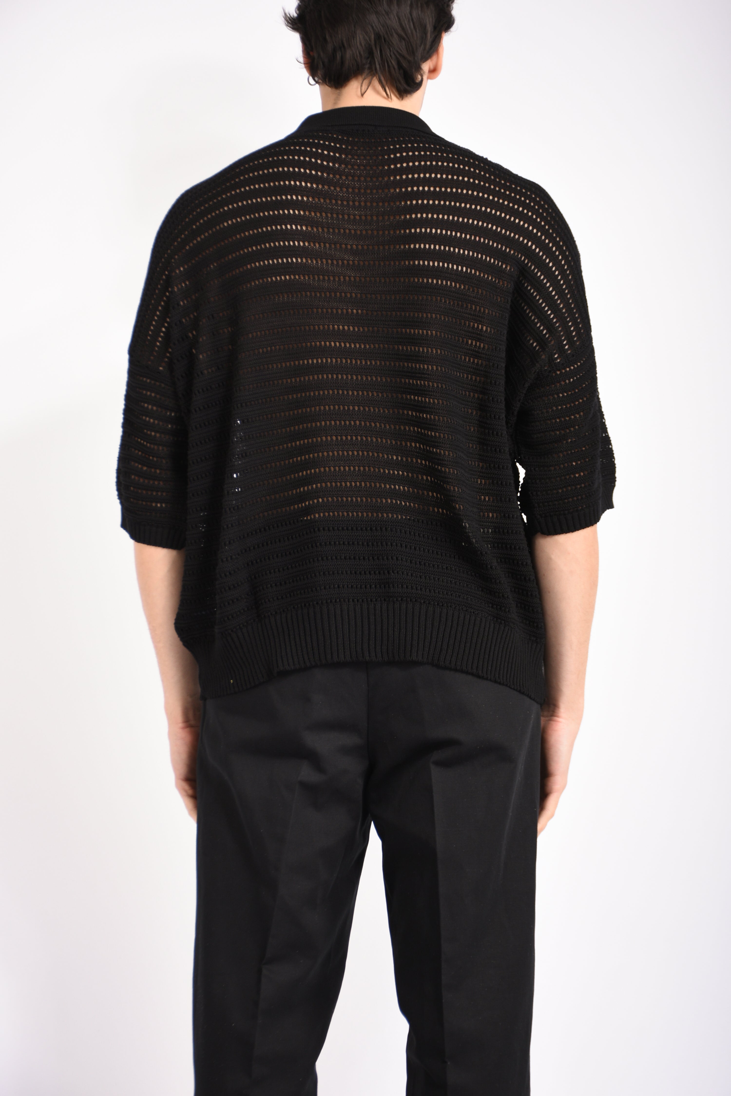 Polo traforata in cotone