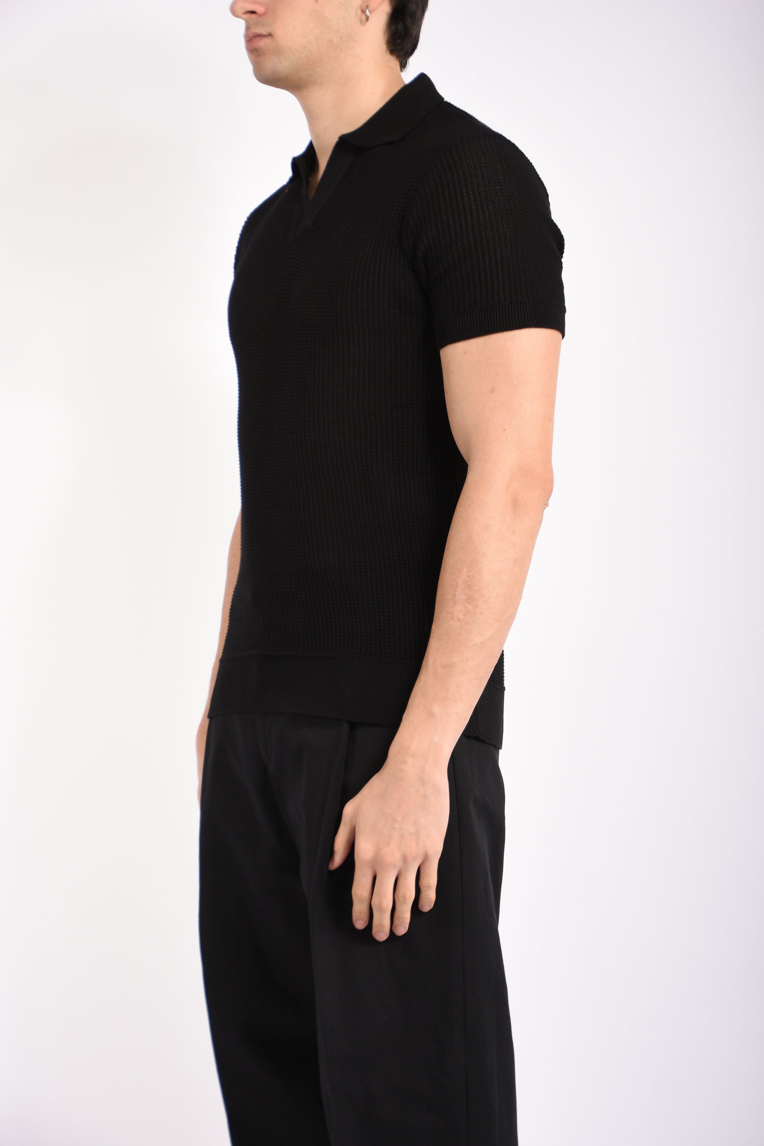 Polo traforata in cotone