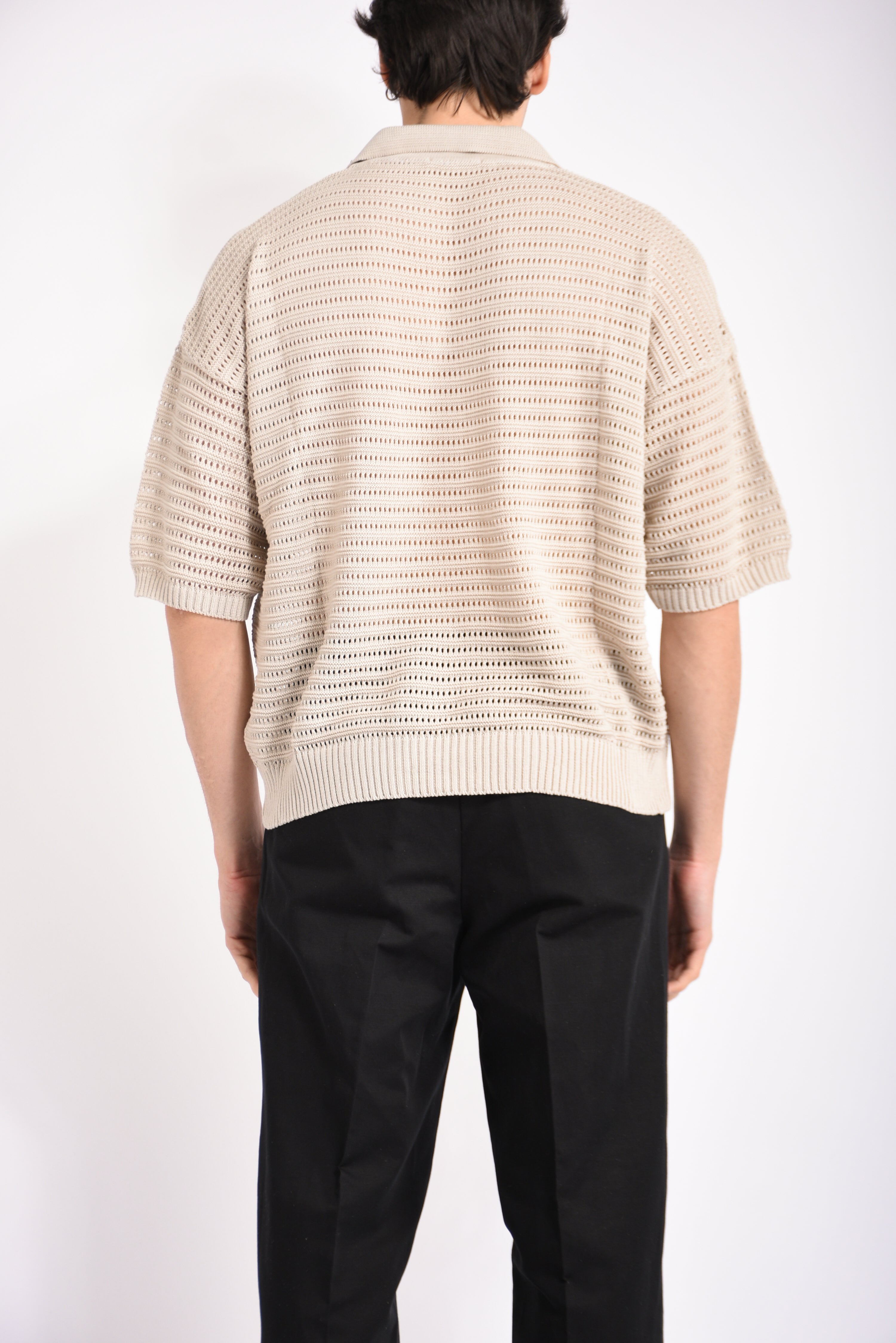 Polo traforata in cotone