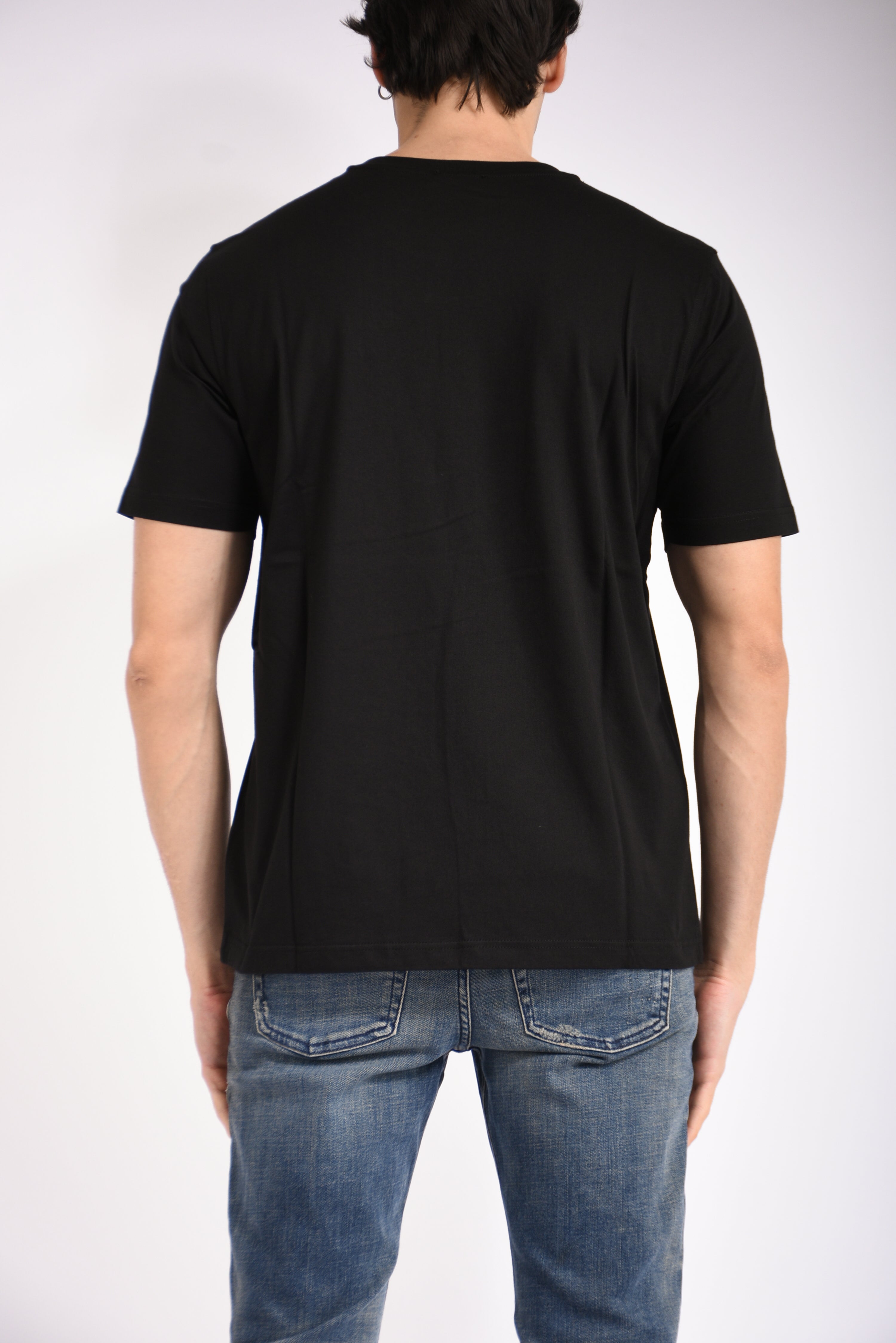 T-shirt con logo micro in metallo