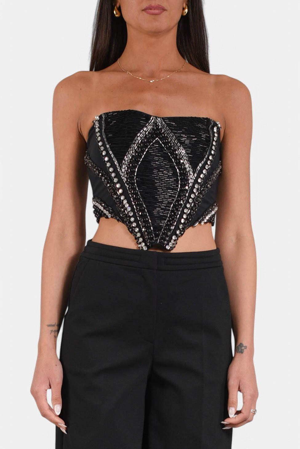 top a bustier con applicazioni