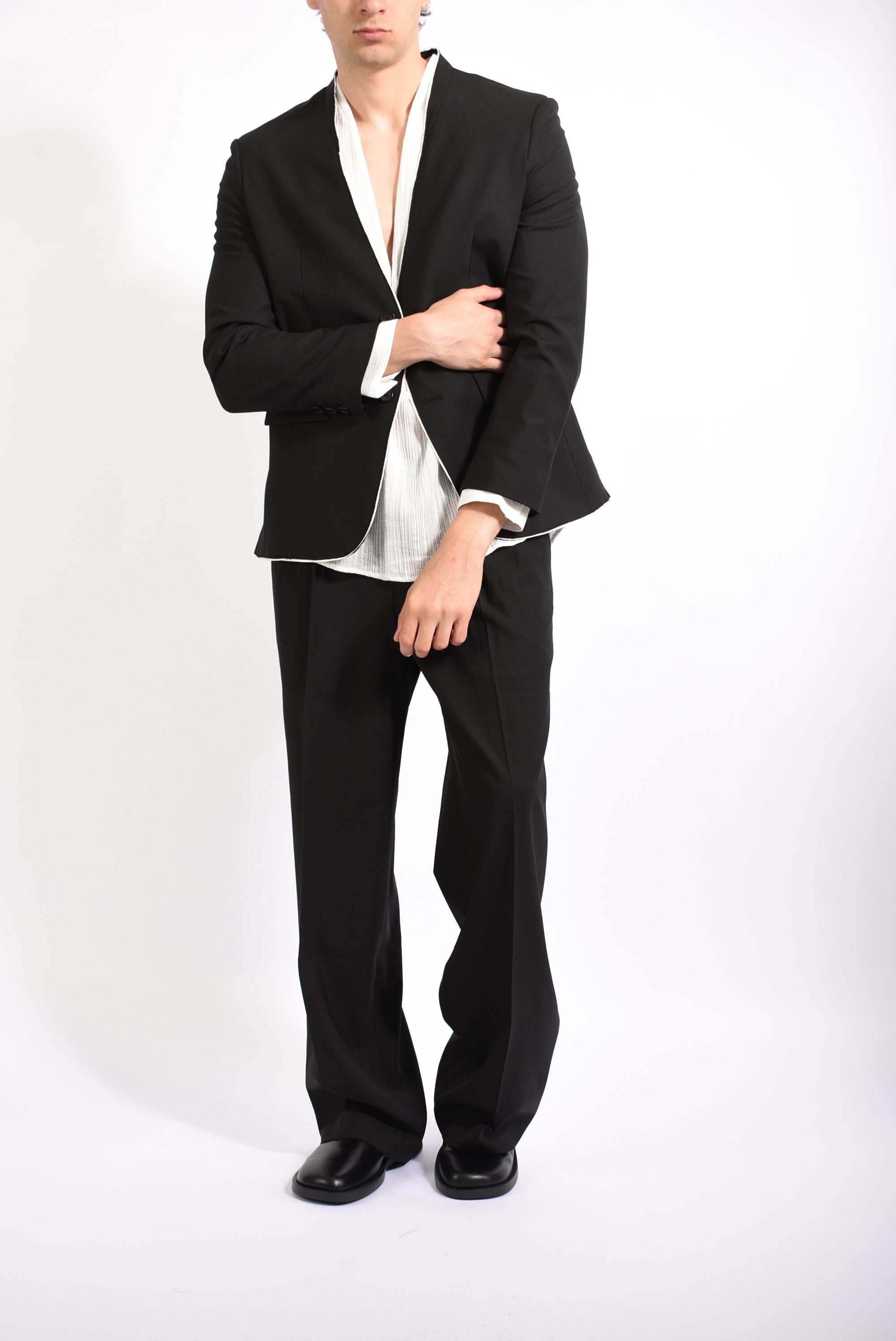 Pantaloni bell in fresco lana