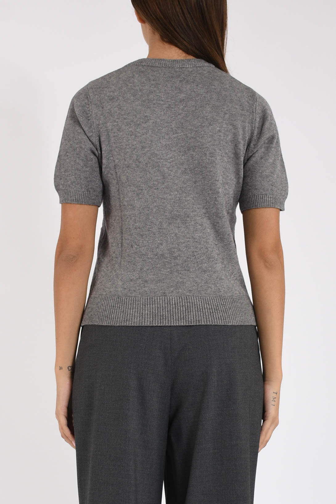 maglia in lana con dettaglio rosa