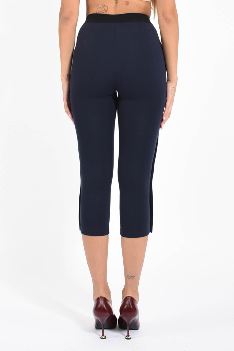 leggings con bottoni modello petto