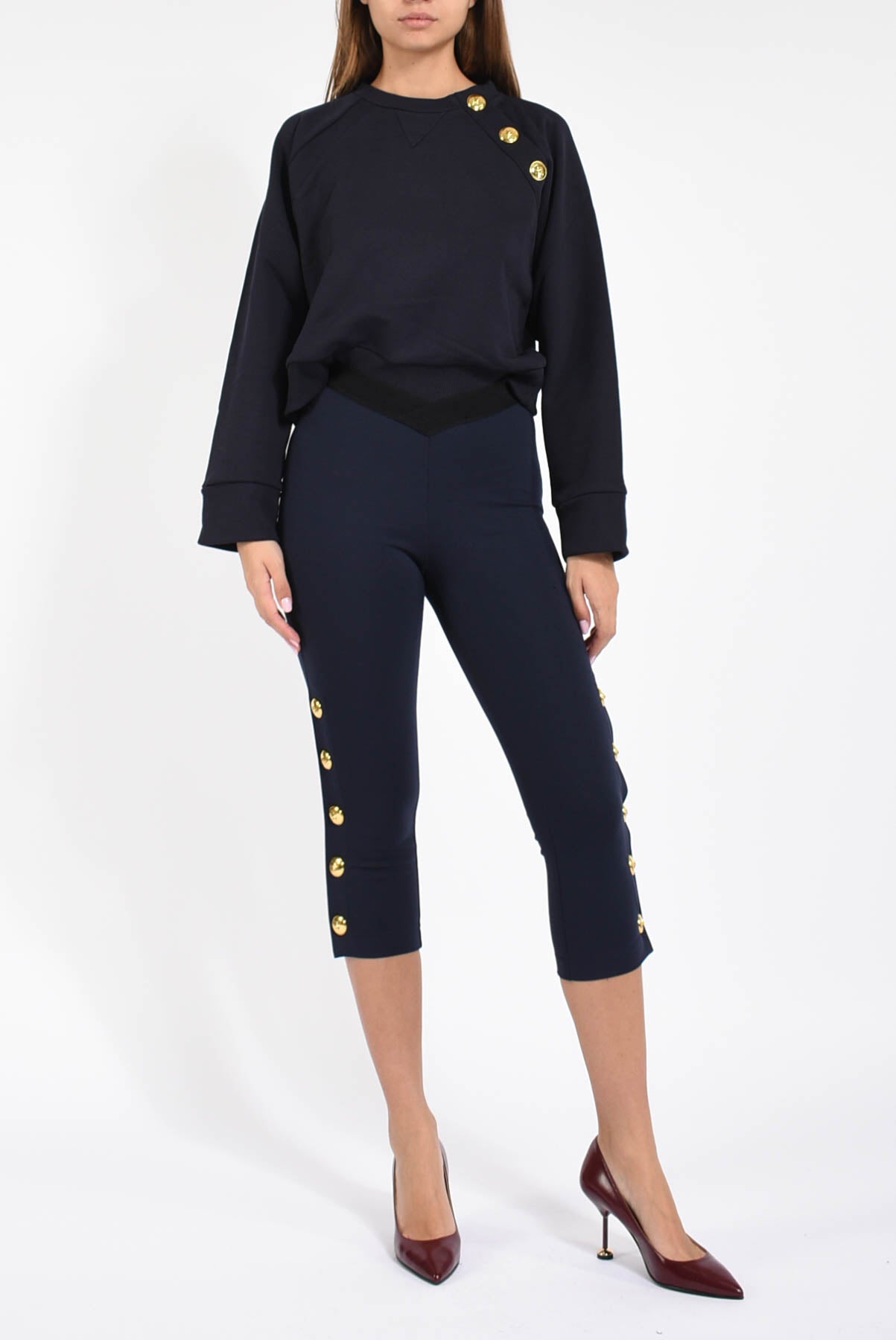 leggings con bottoni modello petto