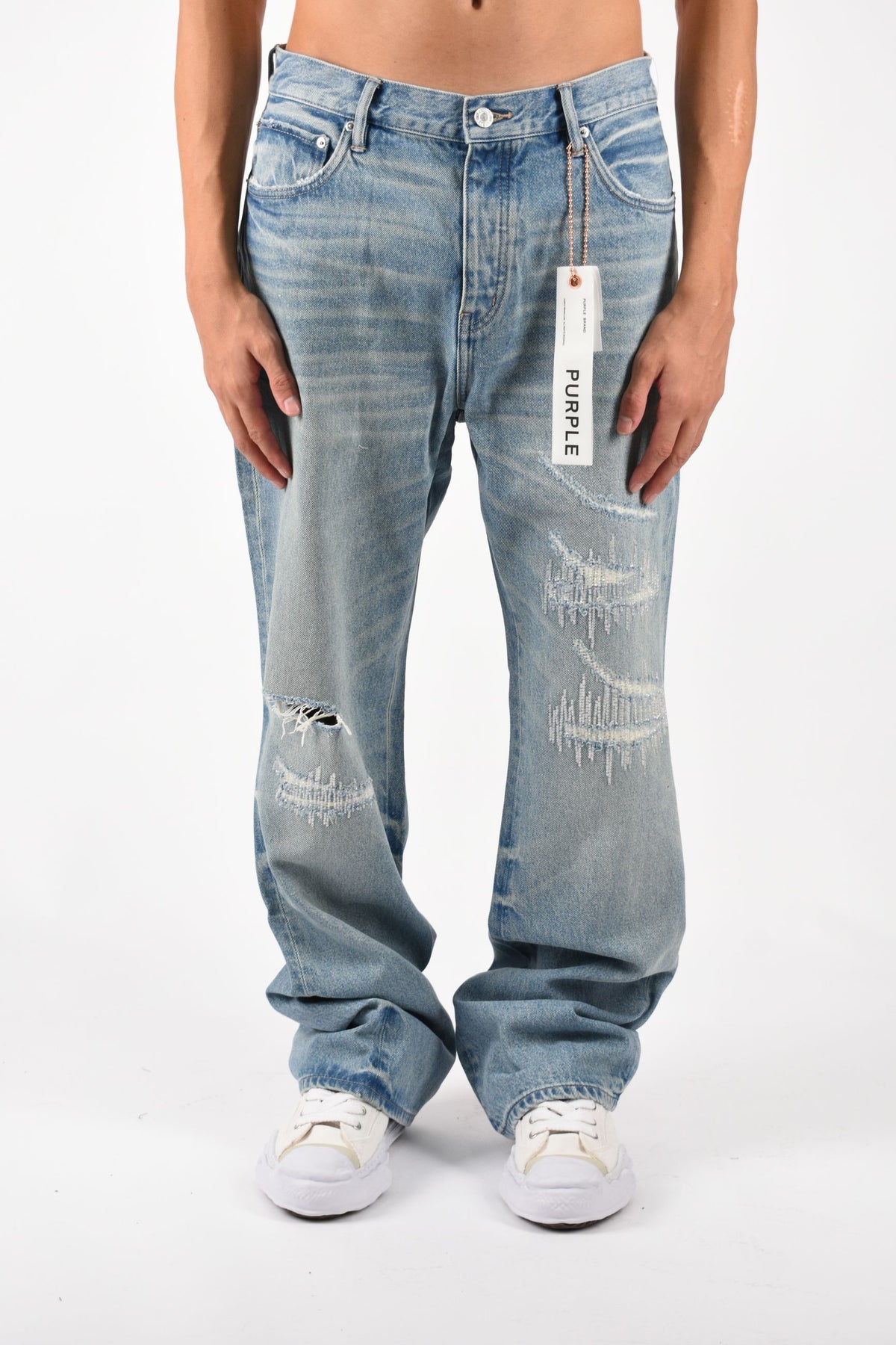 Jeans bootcut rip and repair