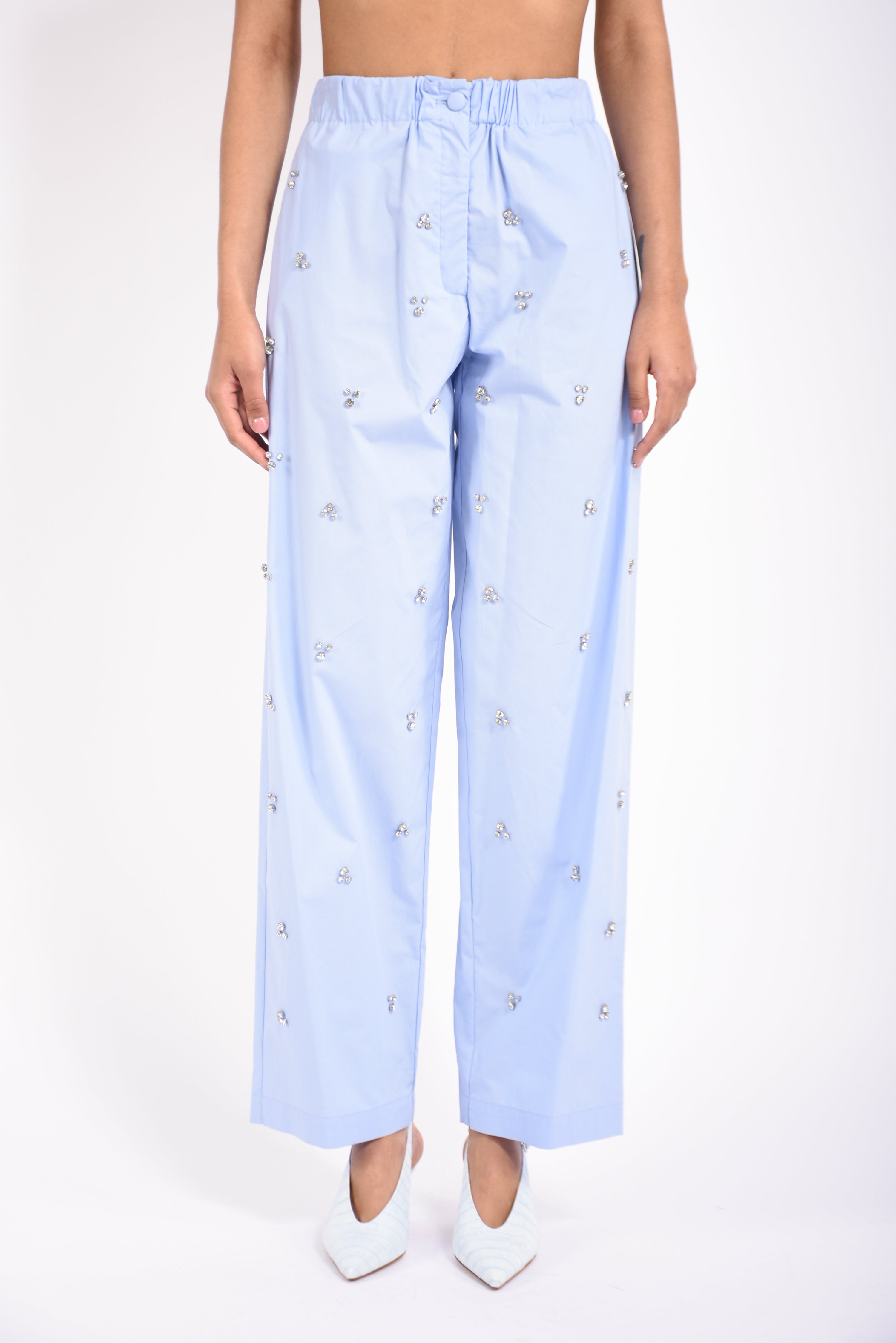 pantaloni in cotone con applicazioni