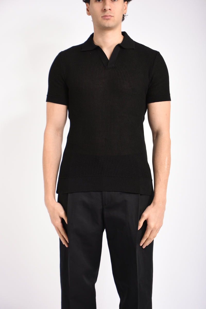 Polo traforata in cotone
