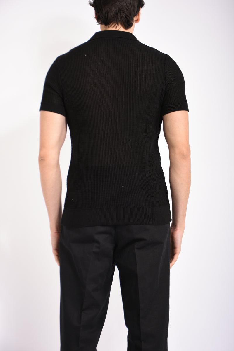 Polo traforata in cotone