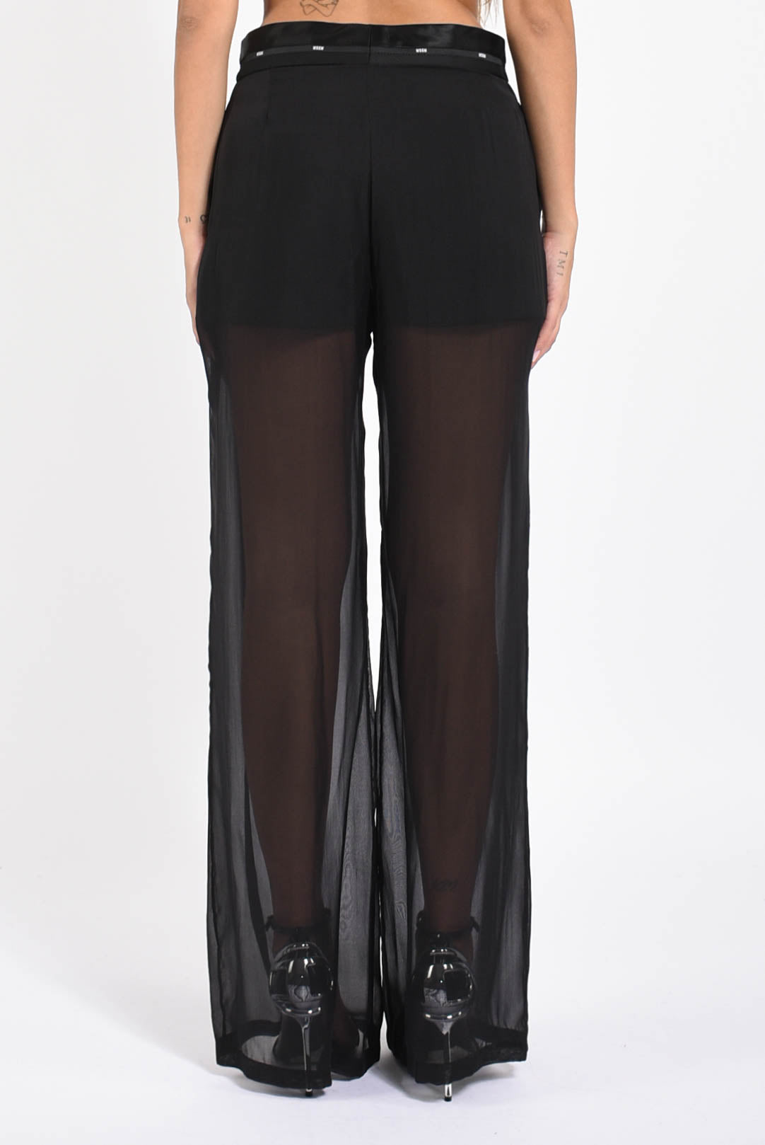 pantaloni con gamba velata