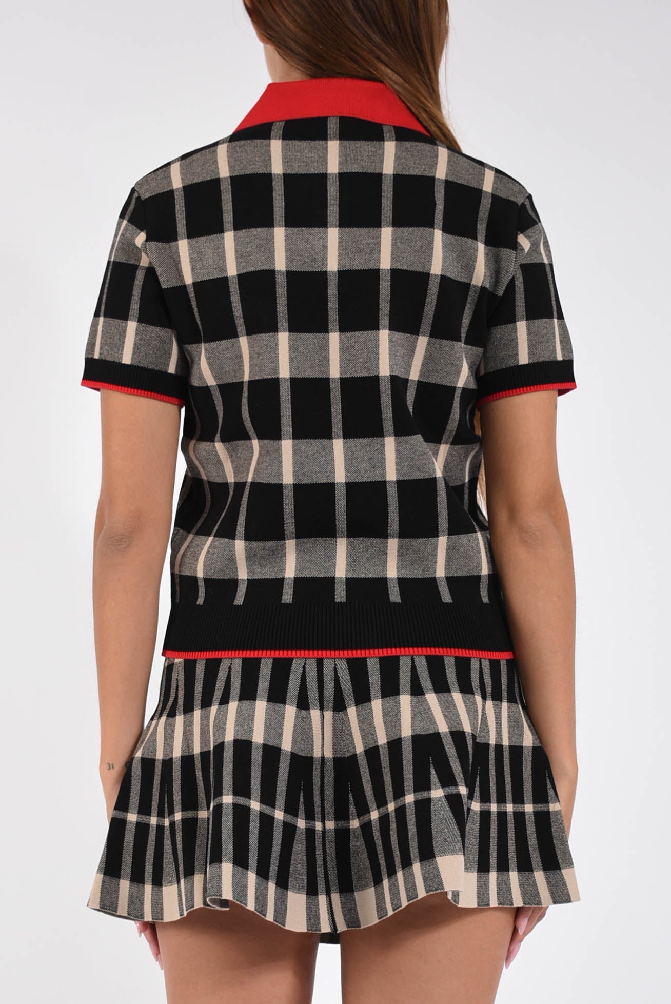 polo  in techno piquet con motivo check