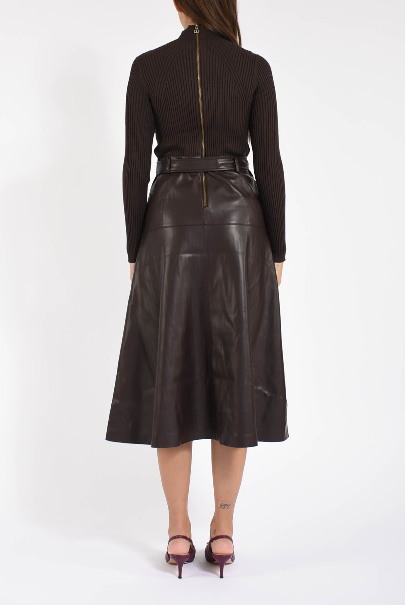 Abito lungo in maglia ed effetto pelle