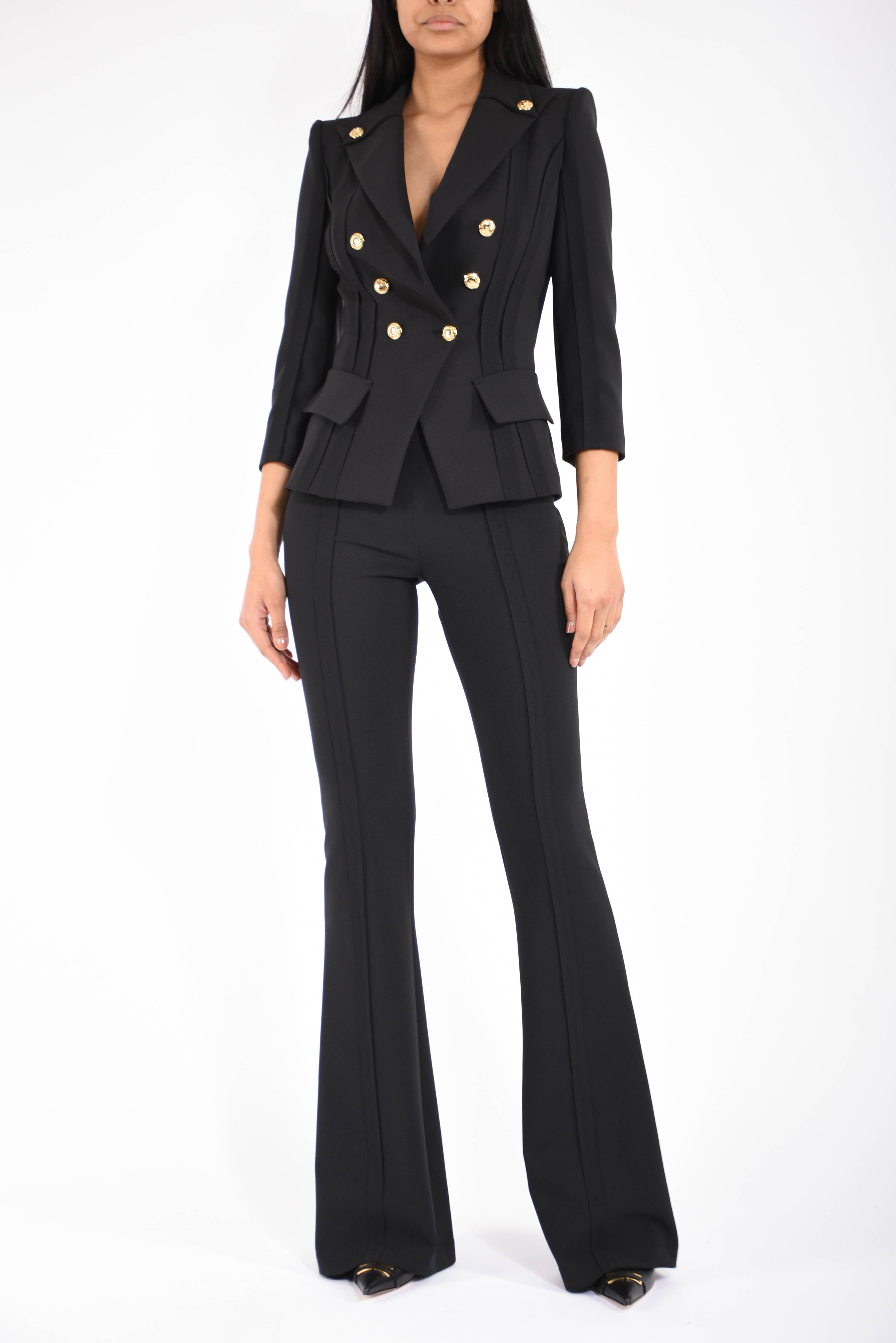 Pantaloni in doppio crêpe stretch con logo charm