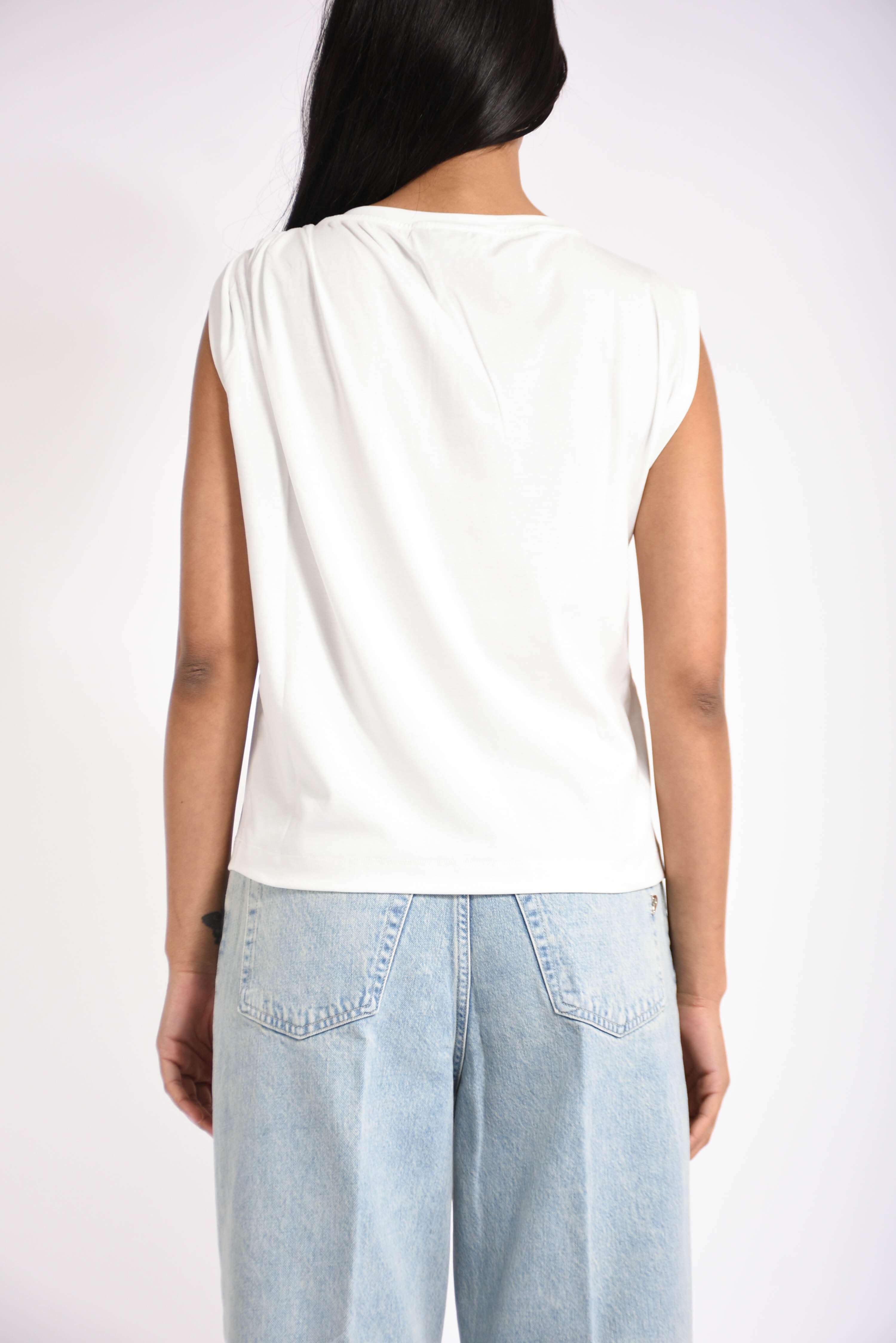 Top con dettaglio dorato melody